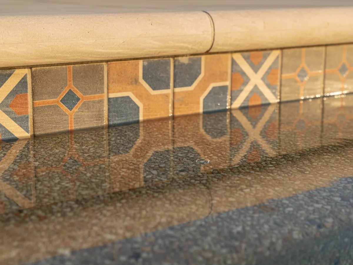 Resurfacing detail work by a licensed San Diego County pool technician